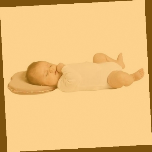 oreiller ergonomique pour nourrisson